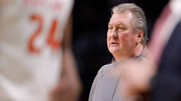 Bob Huggins watches from the sidelines during a West Virginia basketball game.