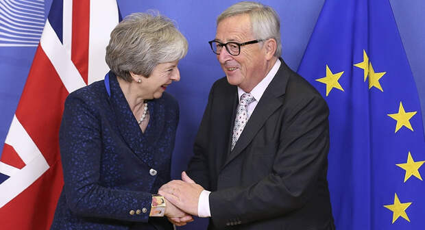 Премьер министр Великобритании Тереза Мэй и глава Еврокомиссии Жан-Клод Юнкер