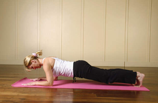 Get a toned tummy by perfecting your plank