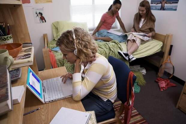 College students in a dorm room.