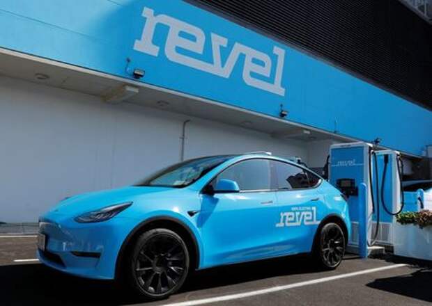 A Revel Tesla electric vehicle is seen at a Revel electric vehicle charging superhub in Brooklyn, New York City, New York, U.S., June 29, 2021. REUTERS/Andrew Kelly