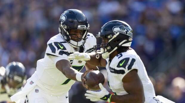 Kenneth Walker and Geno Smith