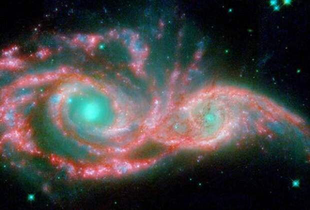 Слияние двух галактик похоже на злое лицо :)