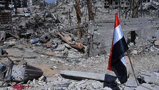 Разрушенные здания на территории бывшего лагеря палестинских беженцев Ярмук в Сирии. Архивное фото