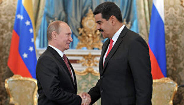 Президент России Владимир Путин и президент Боливарианской Республики Венесуэла Николас Мадуро во время встречи в Большом Кремлевском дворце