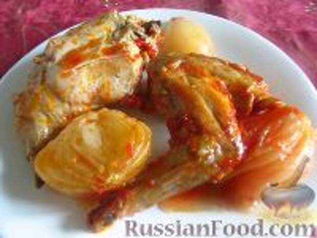 Фото к рецепту: Кролик с луком, тушенный в вине