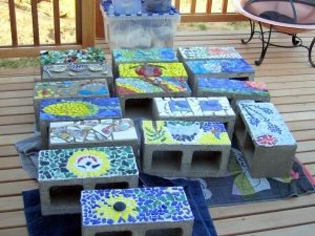 Raised garden bed made out of mosaic cinder blocks. I think I may just do THIS for our garden this year! Turn them on their sides and plant the seedlings in the open holes...perfect containment, no room for weeds! ;): 