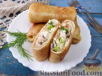 Фото к рецепту: Фаршированные блинчики с тунцом, рисом и яйцом