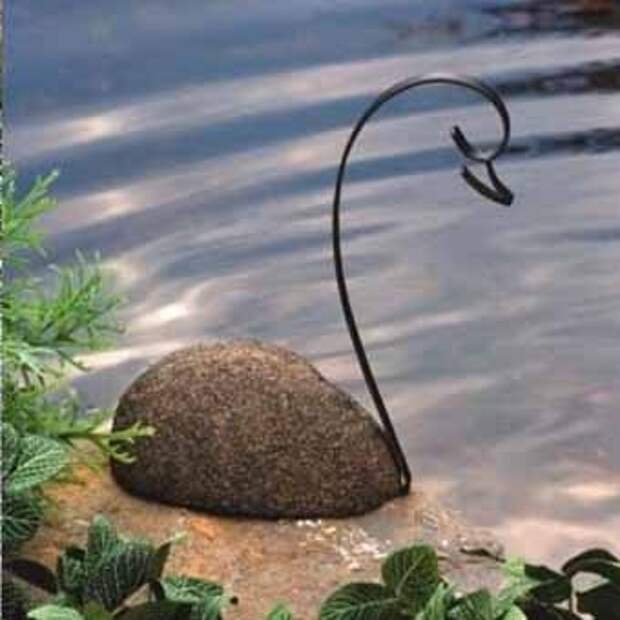 каменный лебедь для водного сада
