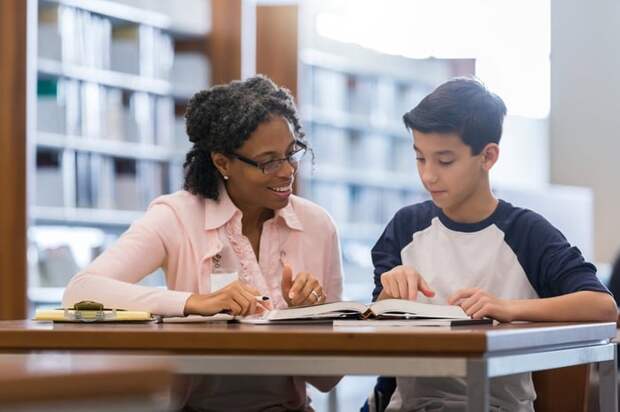 Tutor working with student.