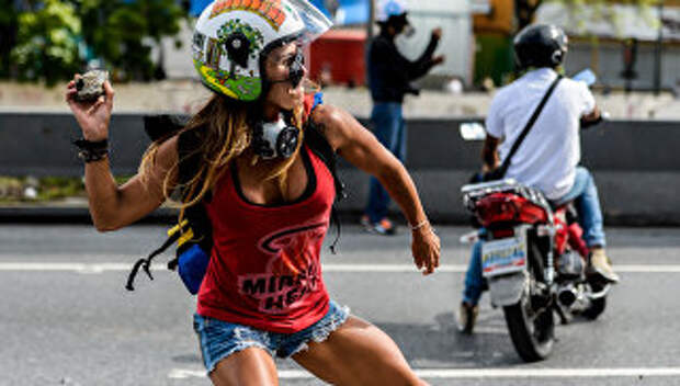 Участница протестов в Венесуэле. Архивное фото
