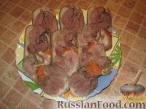 Фото к рецепту: Рулет из рульки "Медвежье ухо" Фото к рецепту: Рулет из рульки "Медвежье ухо"