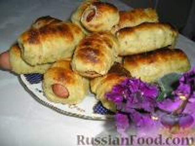 Фото к рецепту: Сосисочки "во фраке" Фото к рецепту: Сосисочки "во фраке"