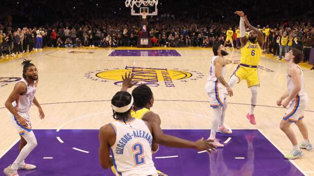 Thomas Bryant calls for the ball on LeBron James's record-setting shot.