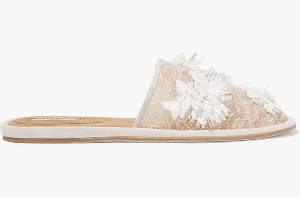 Balenciaga<p><a target="_blank" href="https://www.net-a-porter.com/ua/en/product/691914/balenciaga/suede-trimmed-embellished-lace-slippers">net-a-porter.com</a></p>