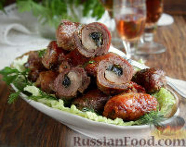 Фото к рецепту: Мясные рулетики с зеленью