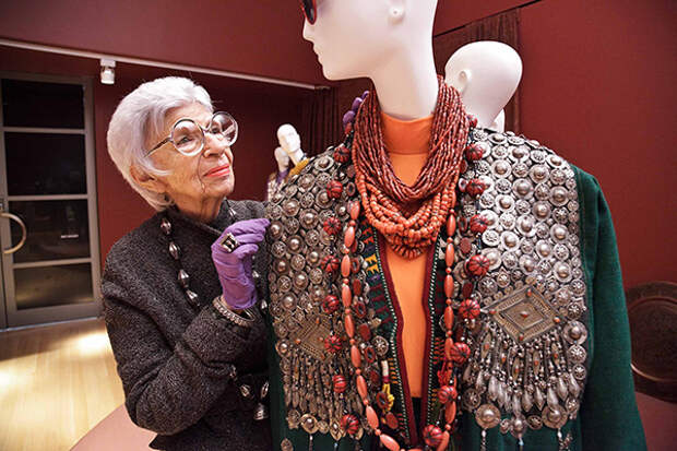 Iris helps carefully install her ensembles. Photo by PEM  Walter Silver.