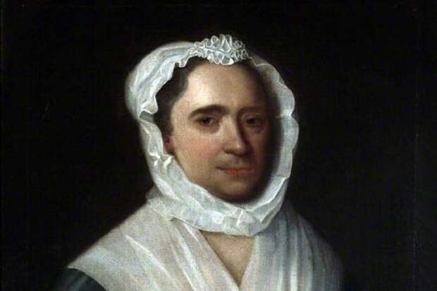 Portrait of a Woman Wearing a Blue Silk Dress Holding a Jasmine Flower