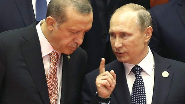 Russian President Vladimir Putin talks with Turkey's President Erdogan during the G20 Summit in Hangzhou