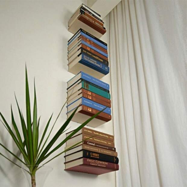 Большое количество книг может выглядеть эстетично и необычно, если постараться. /Фото: spirossoulis.com