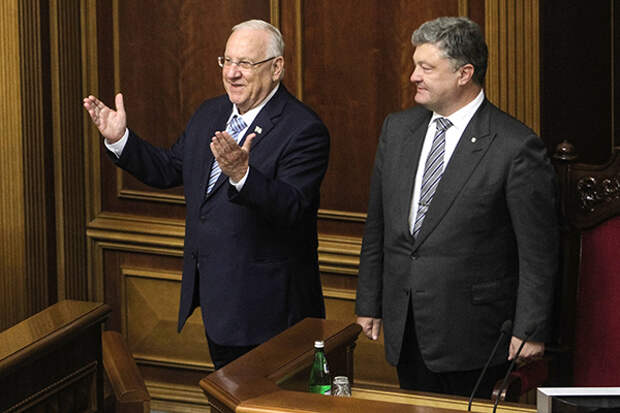 September 27, 2016 - Kiev, Ukraine - President of Israel Reuven Rivlin (L) and Ukrainian President Petro Poroshenko (R) attend a parliamentary hearings on ''The 75th anniversary of the Babyn Yar tragedy: History Lessons and Modernity'' at Ukrainian Parliament Verkhovna Rada, September 27, 2016.President of Israel Reuven Rivlin visits Ukraine for the first state visit
