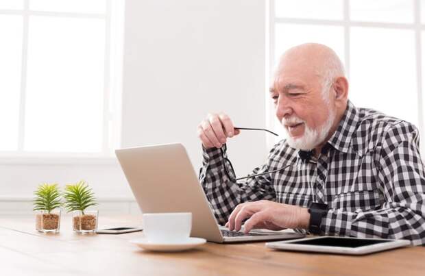 A person at a laptop.