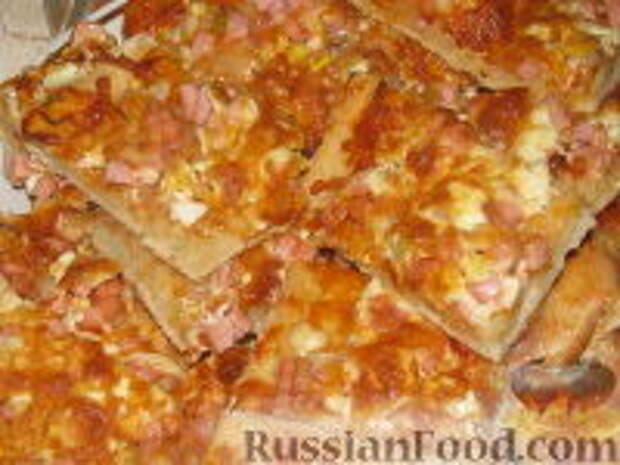 Фото к рецепту: Пицца с вареной колбасой, яйцом и сыром