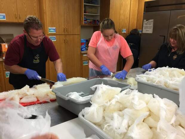 Volunteers preparing Faith Lutheran Church's lutefisk.