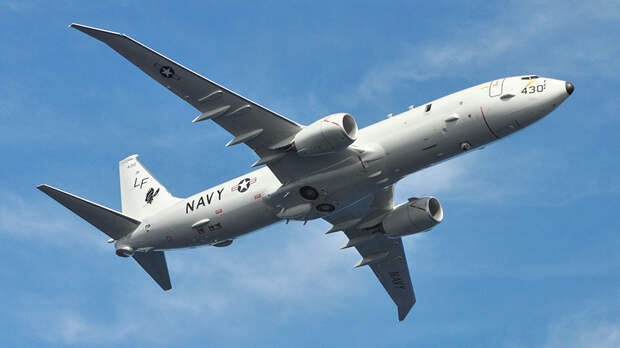 https://cdn.iz.ru/sites/default/files/styles/900x506/public/news-2017-12/Boeing_P-8A_Poseidon_flies_over_Jacksonville_%281%29_1.jpg?itok=JxG2LeP0