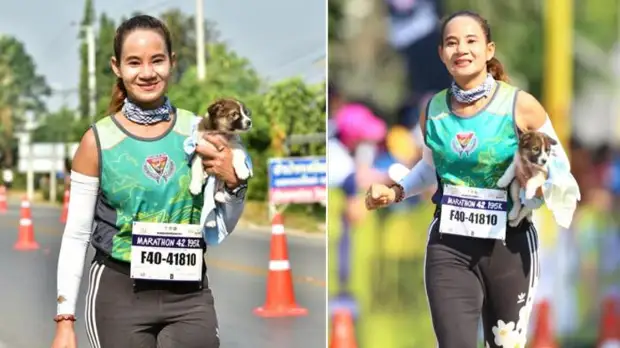 Тайская спортсменка бежала дистанцию со щенком на руках, чтобы его спасти