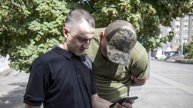 РИА Новости: сотрудники ТЦК ходят на рейды с символикой СС