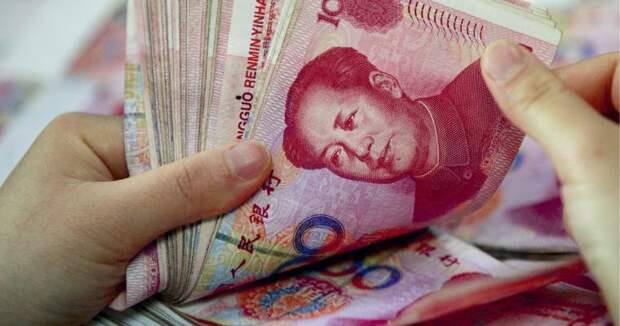 Китай продвигает свою валюту