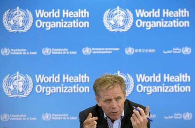 Bruce Aylward, World Health Organization assistant Director General in charge of the operational response on Ebola gestures during a news briefing at the WHO headquarters in Geneva October 14, 2014. REUTERS/Denis Balibouse