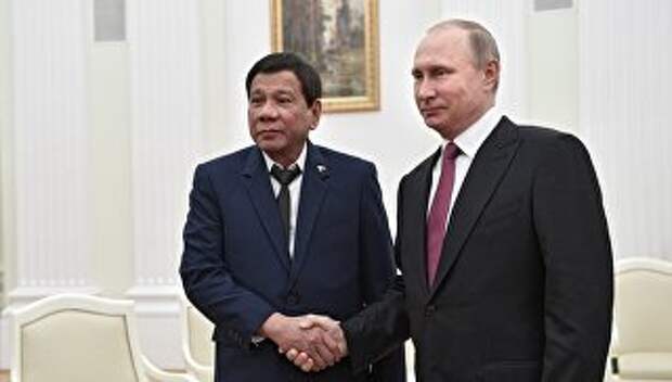 Президент Филиппин Родриго Дутерте и президент РФ Владимир Путин во время встречи. 23 мая 2017