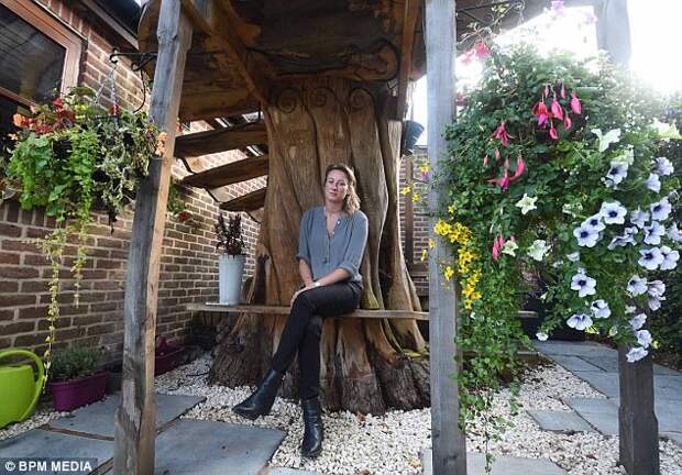 Ms Matty (above), 34, employed tree sculptors to create the wooded attraction from an old oak tree but had not gained planning permission from Solihull Council